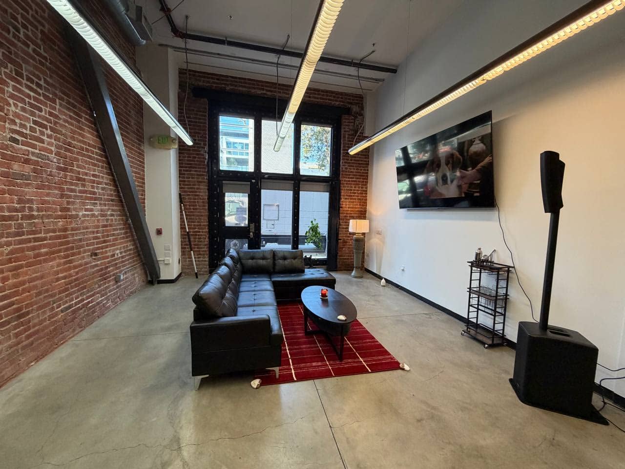 The lounge, brick wall and iron gate door